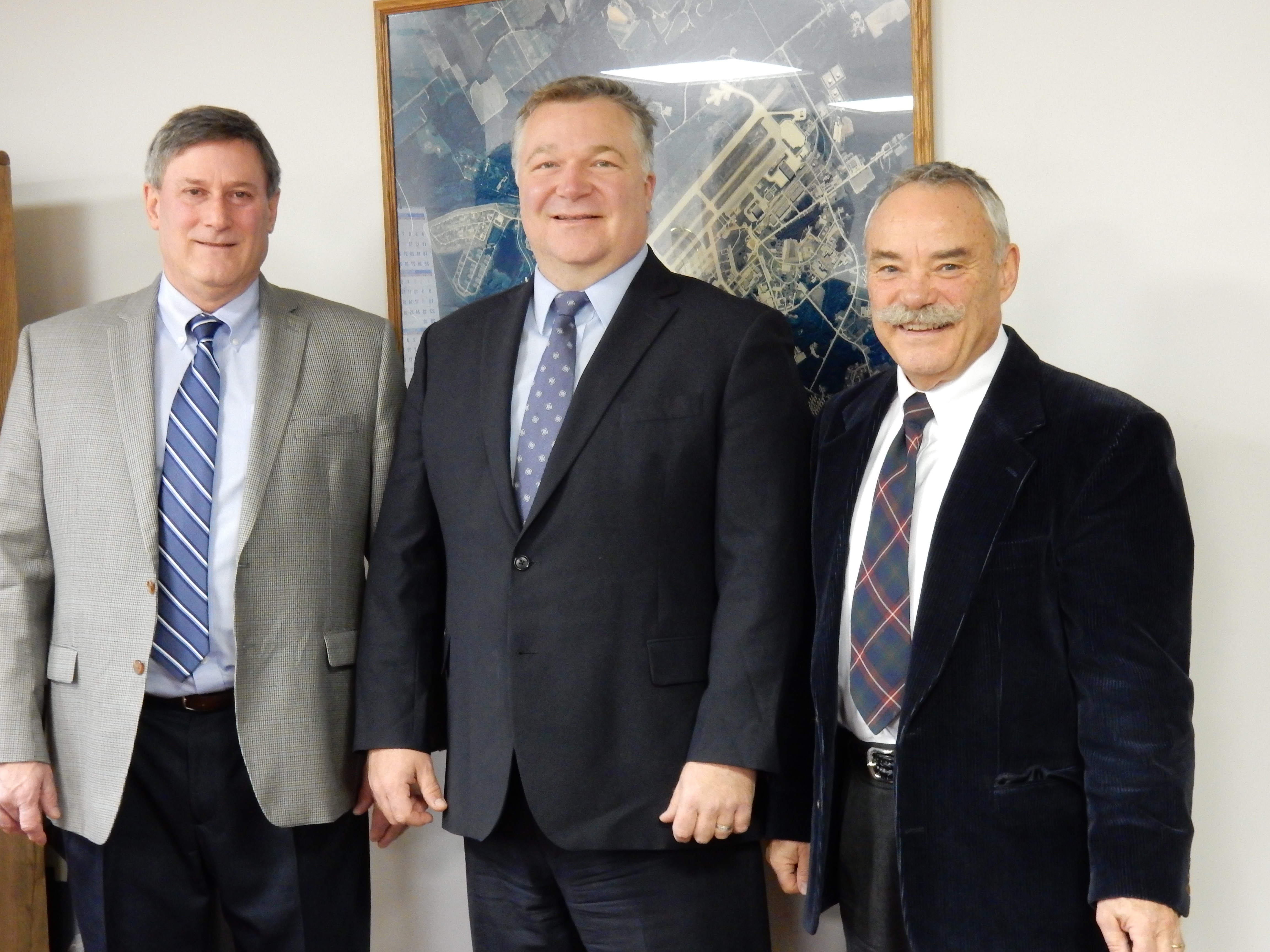 Loring Commerce Center President & CEO Carl Flora, NBRC Federal Co-Chair Mark Scarano, and Alain Ouellette from Northern Maine Development Corporation. 