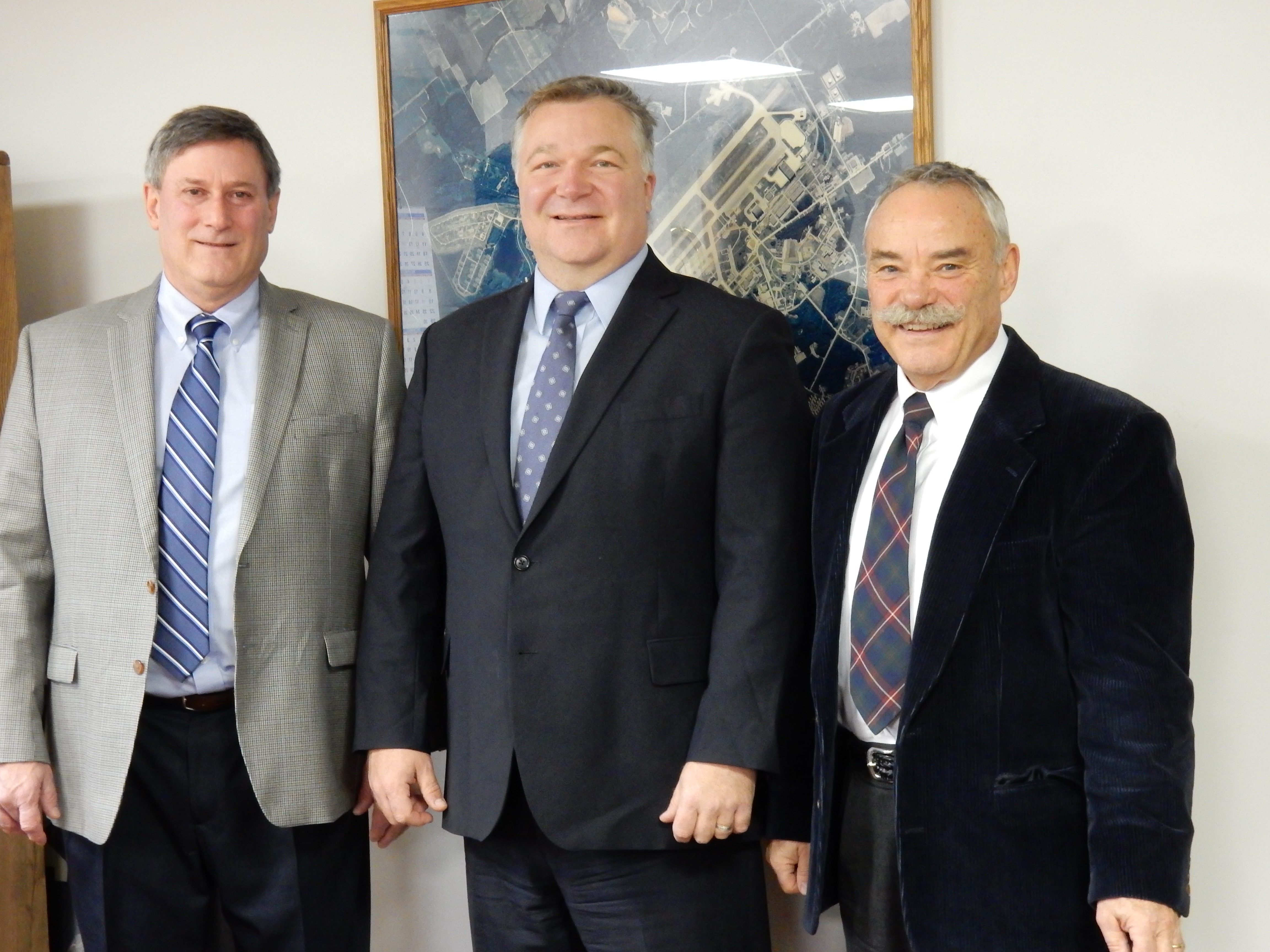 Loring Commerce Center President & CEO Carl Flora, NBRC Federal Co-Chair Mark Scarano, and Alain Ouellette from Northern Maine Development Corporation.